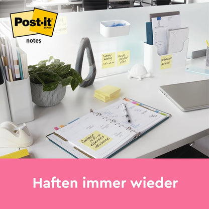 On a tidy desk lie 3M Deutschland GmbH Post-it® Notes, Yellow, 76x76 mm. Both standard and Super Sticky notes are visible, with the Post-it logo and the text "Sticks over and over." Includes 14+4 blocks/package and PEFC-certified paper.