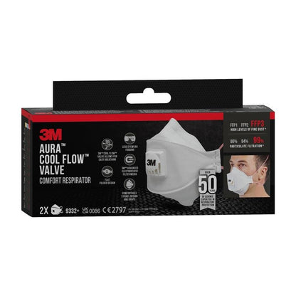 Depicted is a box of the 3M™ Aura™ Comfort Cool Flow™ Particulate Respirator 9332+, FFP3, with valve from 3M Deutschland GmbH with an image of the white mask and the wearer. The box contains 2 masks and highlights filtration efficiency and comfort.