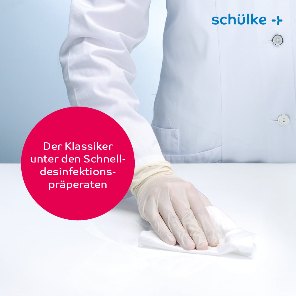 A person in a white lab coat and gloves wipes a surface with Schülke Mikrozid AF Wipes premium disinfectant wipes - 50 wipes | pack (50 wipes). In a red circle, the German text is visible, which translates to "The classic among rapid disinfectants." In the upper right corner, the word "Schülke & Mayr GmbH" is visible in blue letters.